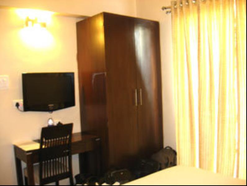 Hotel The Elite Suites Pune Rum bild