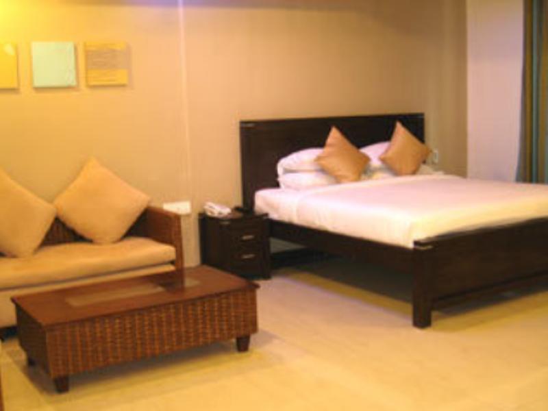 Hotel The Elite Suites Pune Rum bild