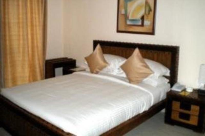 Hotel The Elite Suites Pune Rum bild
