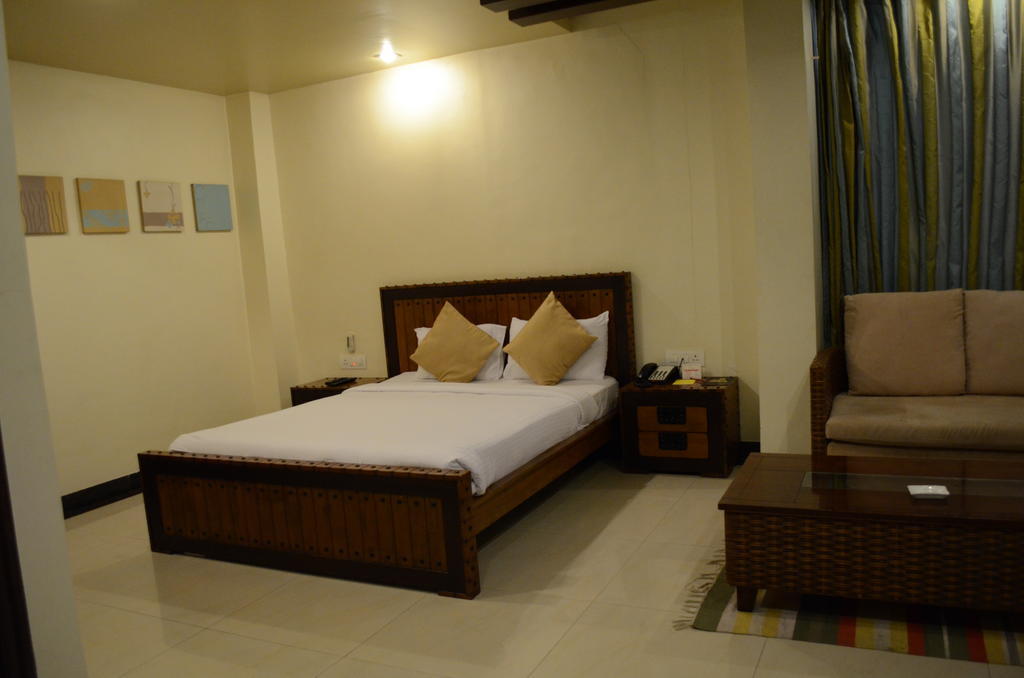 Hotel The Elite Suites Pune Rum bild